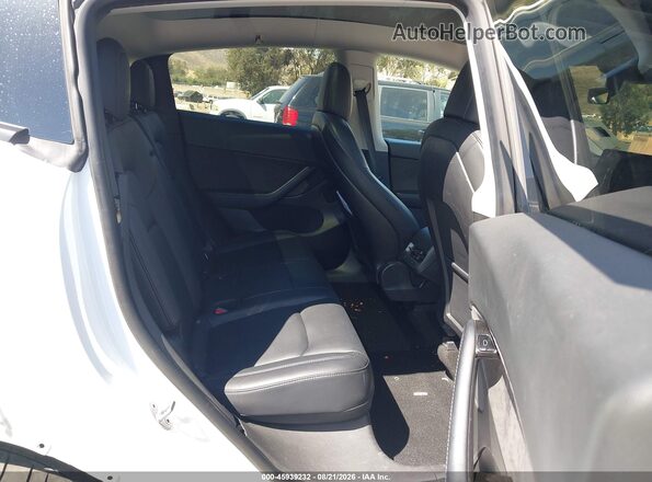 5YJYGDEE2MF112154 2021 TESLA MODEL Y White VIN կոդի պիտակի տեսք