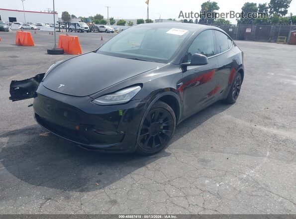 5YJYGDEE8MF160595 2021 TESLA MODEL Y Black წინა მარცხენა ხედი სამი მეოთხედიდან