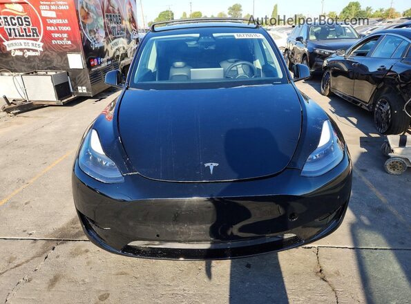 5YJYGDEF5MF216081 2021 TESLA MODEL Y Black Vista interior trasera