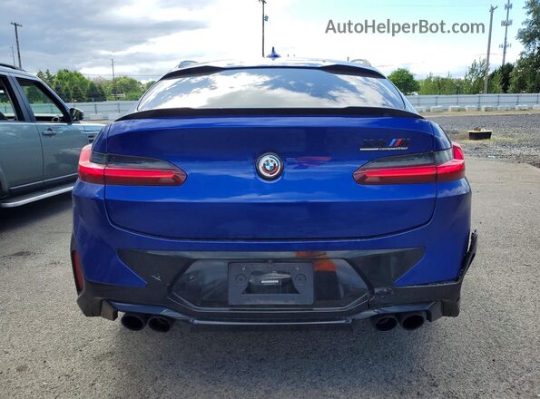 5YM23EC00N9N37115 2022 BMW X4 Blue Rear view