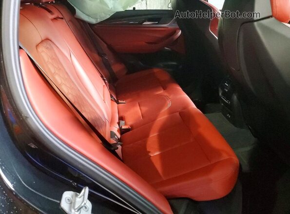 5YMTS0C06M9H06355 2021 BMW X3 Black Widok tylnych siedzeń