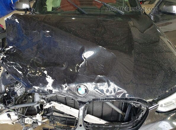 5YMTS0C06M9H06355 2021 BMW X3 Black Widok wnętrza z tyłu
