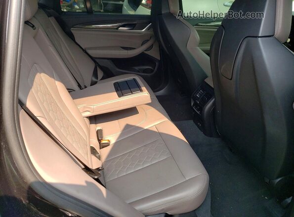 5YMTS0C08M9G40441 2021 BMW X3 Black Rear interior view