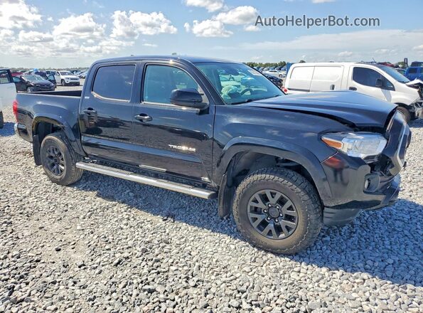 3TMCZ5AN7PM548983 2023 TOYOTA TACOMA Black Front view