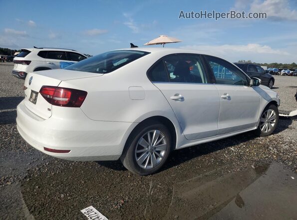 3VWD67AJ5GM402889 2016 VOLKSWAGEN JETTA Белый Передняя правая четверть