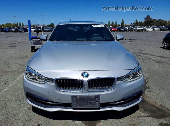 WBA8E1C57HK895095 2017 BMW 3 SERIES Silver Widok z tyłu