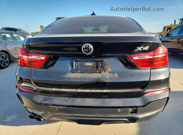 5UXXW5C58G0N92953 2016 BMW X4 Black Front interior view