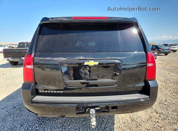 1GNSKHKCXKR119981 2019 CHEVROLET SUBURBAN Черный Вид салона спереди