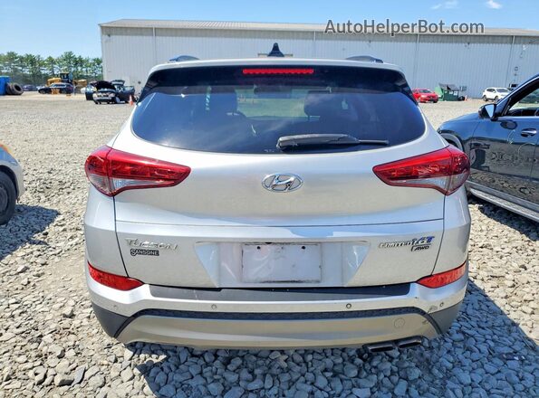 KM8J3CA25HU294329 2017 HYUNDAI TUCSON Silver Vista interior delantera
