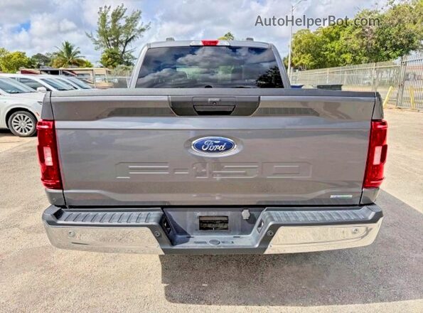 1FTEW1C86PKD23334 2023 FORD F150 Gray Вид салону спереду