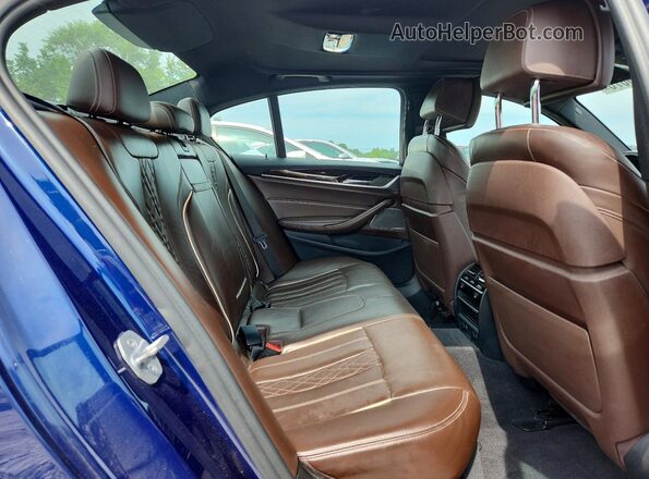 WBAJB9C59JB049338 2018 BMW M5 Синий Вид задней части салона