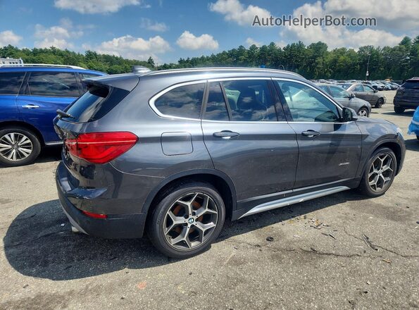 WBXHT3C31GP882429 2016 BMW X1 Gray Front right