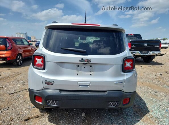 ZACNJBBB3KPK30493 2019 JEEP RENEGADE Silver Front interior view