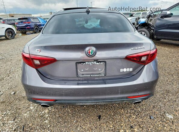 ZARFAEDNXJ7563985 2018 ALFA ROMEO GIULIA Gray Front interior view