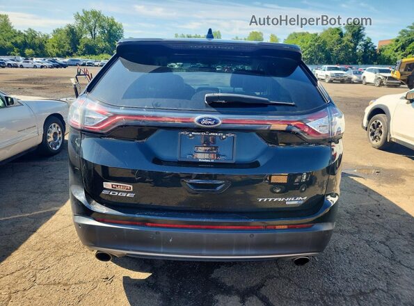 2FMPK4K96GBB83338 2016 FORD EDGE Черный Вид салона спереди