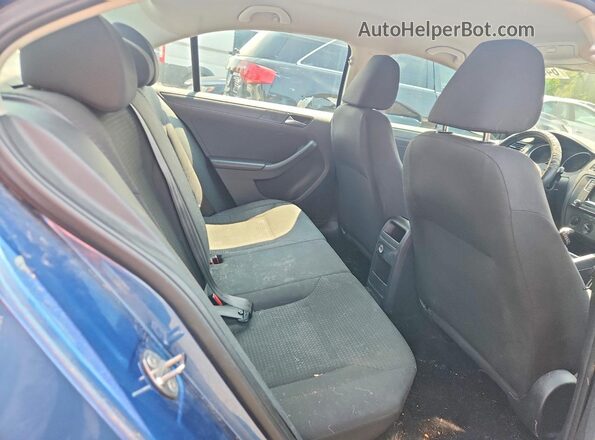 3VW267AJXGM292655 2016 VOLKSWAGEN JETTA Blue Вид задньої частини салону