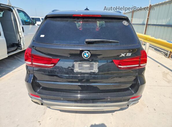 5UXKT0C55J0V99470 2018 BMW X5 Черный Вид салона спереди