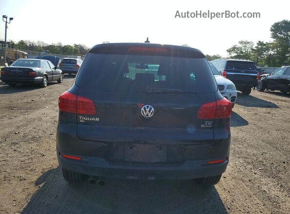WVGBV7AX0GW515176 2016 VOLKSWAGEN TIGUAN Black Вид салону спереду