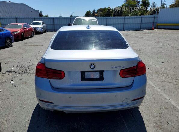 WBA8E1C57HK895095 2017 BMW 3 SERIES Silver Widok wnętrza z przodu