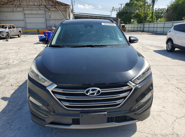 KM8J3CA24GU123571 2016 HYUNDAI TUCSON Black უკანა ხედი