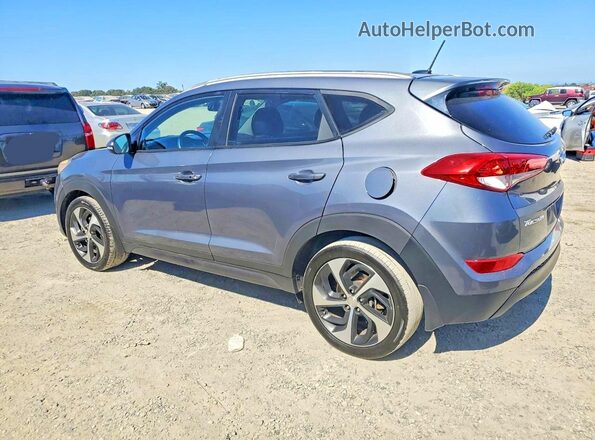 KM8J33A29GU112842 2016 HYUNDAI TUCSON Gray Trasero derecho