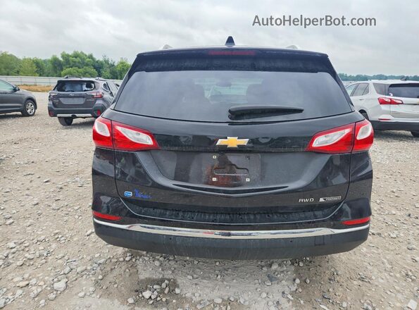 3GNAXXEUXJL389097 2018 CHEVROLET EQUINOX Черный Вид салона спереди