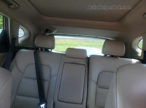 KM8J3CA28GU084659 2016 HYUNDAI TUCSON Темно-бордовый Вид задней части салона