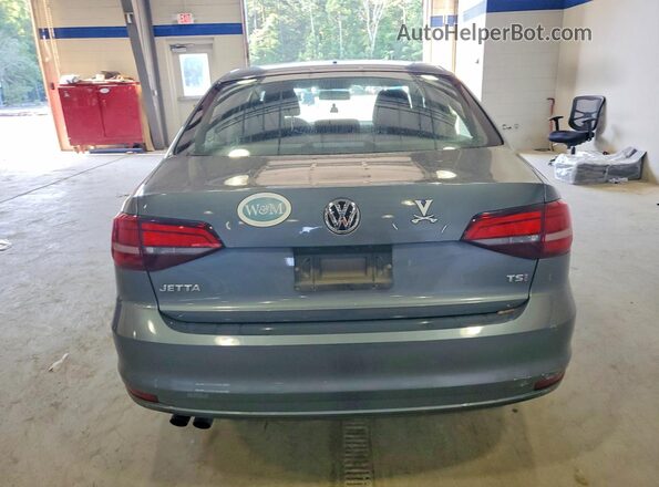 3VW2B7AJ4HM329423 2017 VOLKSWAGEN JETTA Серебряный Вид салона спереди