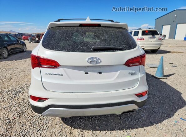 5NMZUDLB4HH032946 2017 HYUNDAI SANTA FE White Vista interior delantera