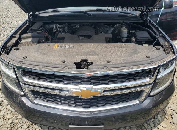 1GNSKHKC8JR265133 2018 CHEVROLET SUBURBAN Black VIN կոդի պիտակի տեսք