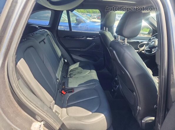 WBXHT3C31GP882429 2016 BMW X1 Gray Engine compartment view