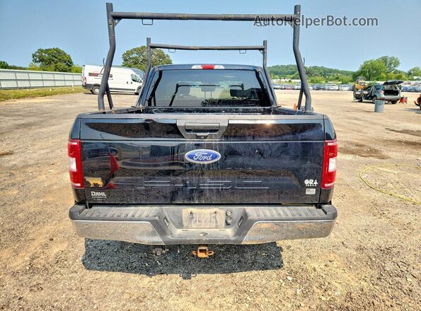 1FTEW1E55JFC65297 2018 FORD F150 Черный Вид салона спереди