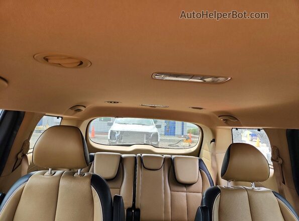 KNDMC5C12G6159054 2016 KIA SEDONA Black Widok wnętrza z tyłu