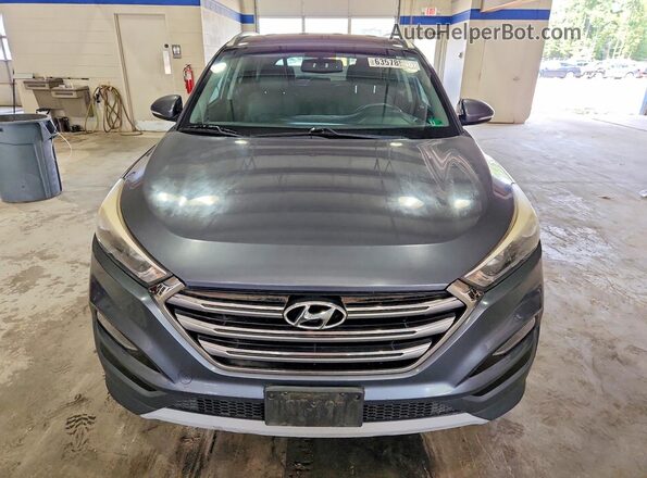 KM8J33A2XHU389033 2017 HYUNDAI TUCSON Gray Вид ззаду