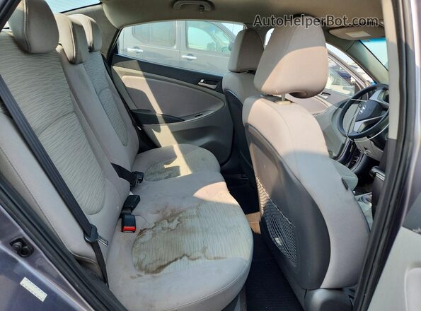 KMHCT4AE5GU086040 2016 HYUNDAI ACCENT Gray Vista interior trasera