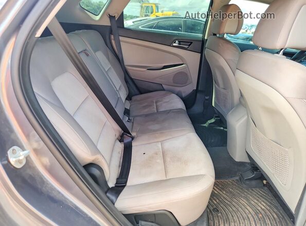 KM8J33A47GU228770 2016 HYUNDAI TUCSON Charcoal Vista del compartimento del motor