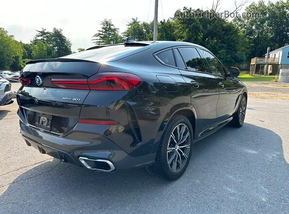 5UXCY4C06L9D37668 2020 BMW X6 Black Przód prawy