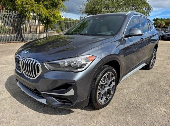 WBXJG7C0XL5P55560 2020 BMW X1 Gray Trasero izquierdo