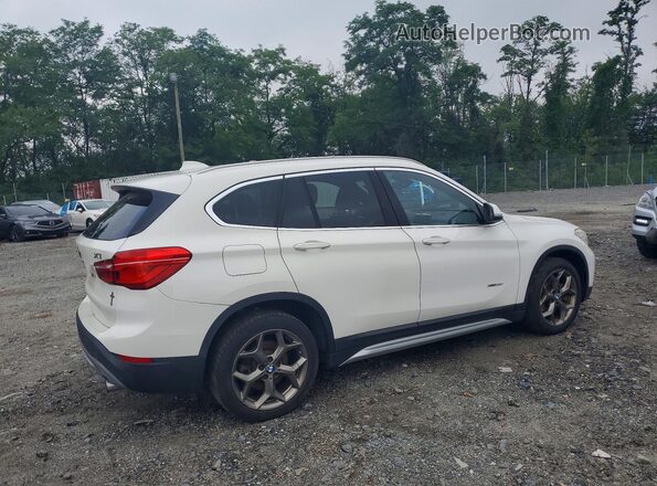 WBXHT3Z32G4A48942 2016 BMW X1 White Przód prawy