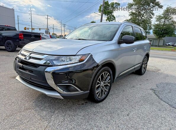 JA4AZ3A32GZ018262 2016 MITSUBISHI OUTLANDER Silver Trasero izquierdo