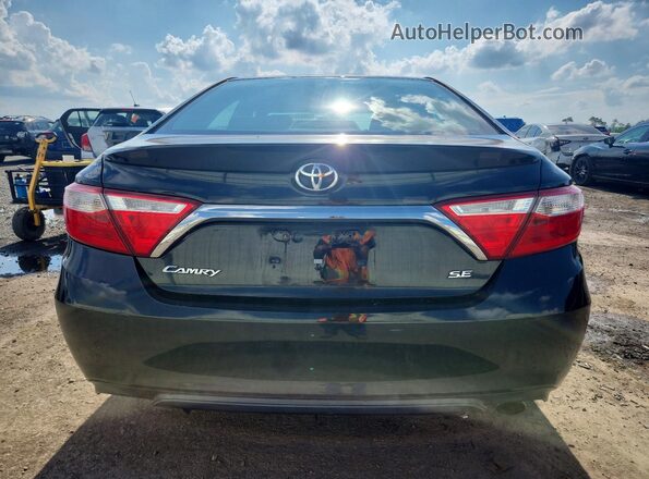 4T1BF1FK7HU713810 2017 TOYOTA CAMRY Black Widok wnętrza z przodu