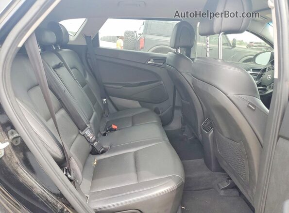 KM8J33A2XGU146028 2016 HYUNDAI TUCSON Черный Вид задней части салона