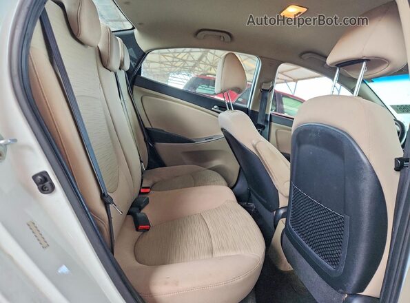 KMHCT4AE1GU165477 2016 HYUNDAI ACCENT White Rear interior view