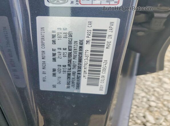 JM1BM1M79G1348779 2016 MAZDA 3 Gray Вид наклейки з VIN-кодом