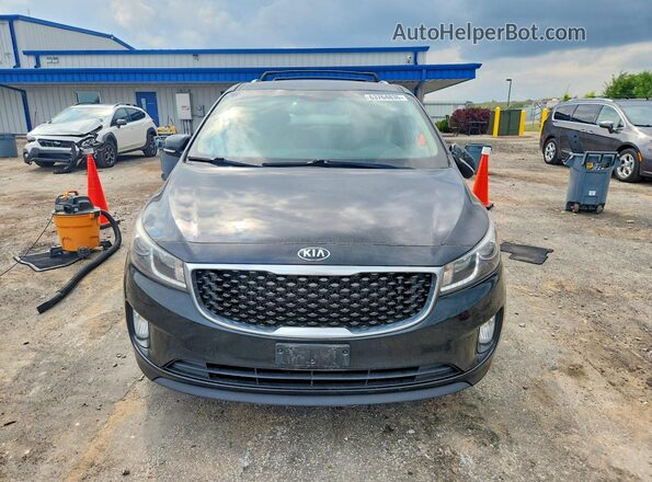 KNDMC5C12G6159054 2016 KIA SEDONA Black Widok z tyłu