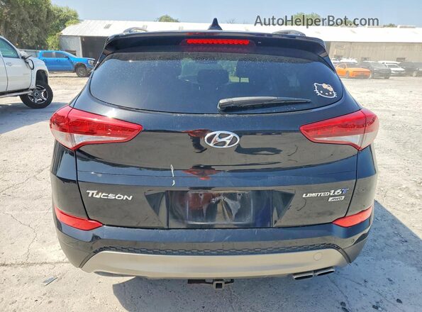 KM8J3CA24GU123571 2016 HYUNDAI TUCSON Black წინა სალონის ხედი