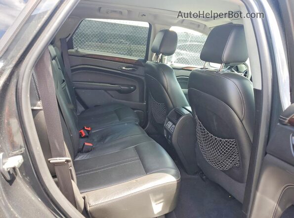 3GYFNBE31GS552940 2016 CADILLAC SRX Серый Вид задней части салона