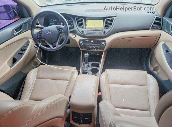 KM8J33A20GU076961 2016 HYUNDAI TUCSON Brown Vista del cuadro de instrumentos