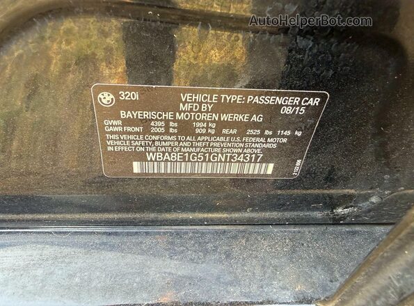 WBA8E1G51GNT34317 2016 BMW 3 SERIES Black Rear interior view