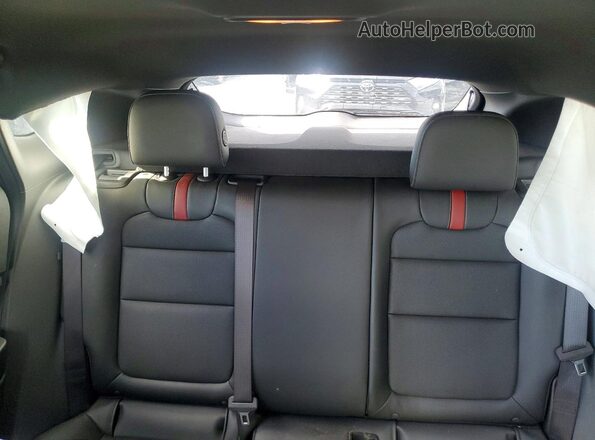KL77LJEP0SC210937 2025 CHEVROLET TRAX Gray Vista interior trasera